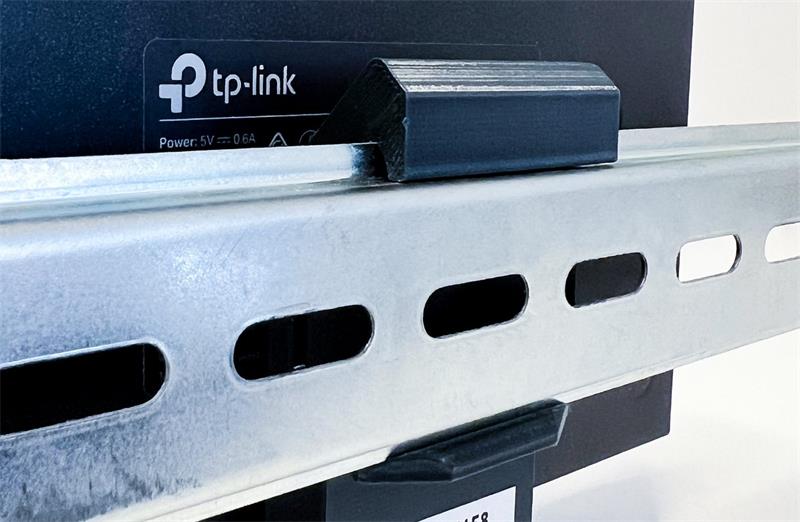 TP-LINK držák na DIN lištu pro rozmer 101x25mm šedá antracit SG108xx/SF1006P/ER605/RP108GE 